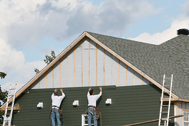 Professional Vinyl Siding technician working in Timberlake, NC